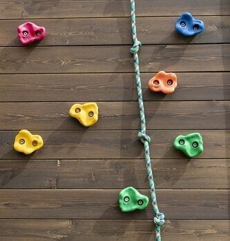 Kids Climbing On Wooden Wall Outdoor.